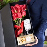 PACK FIOBOX 12 ROSAS ROJAS + BOTELLA DE VINO + CHOCOLATE
